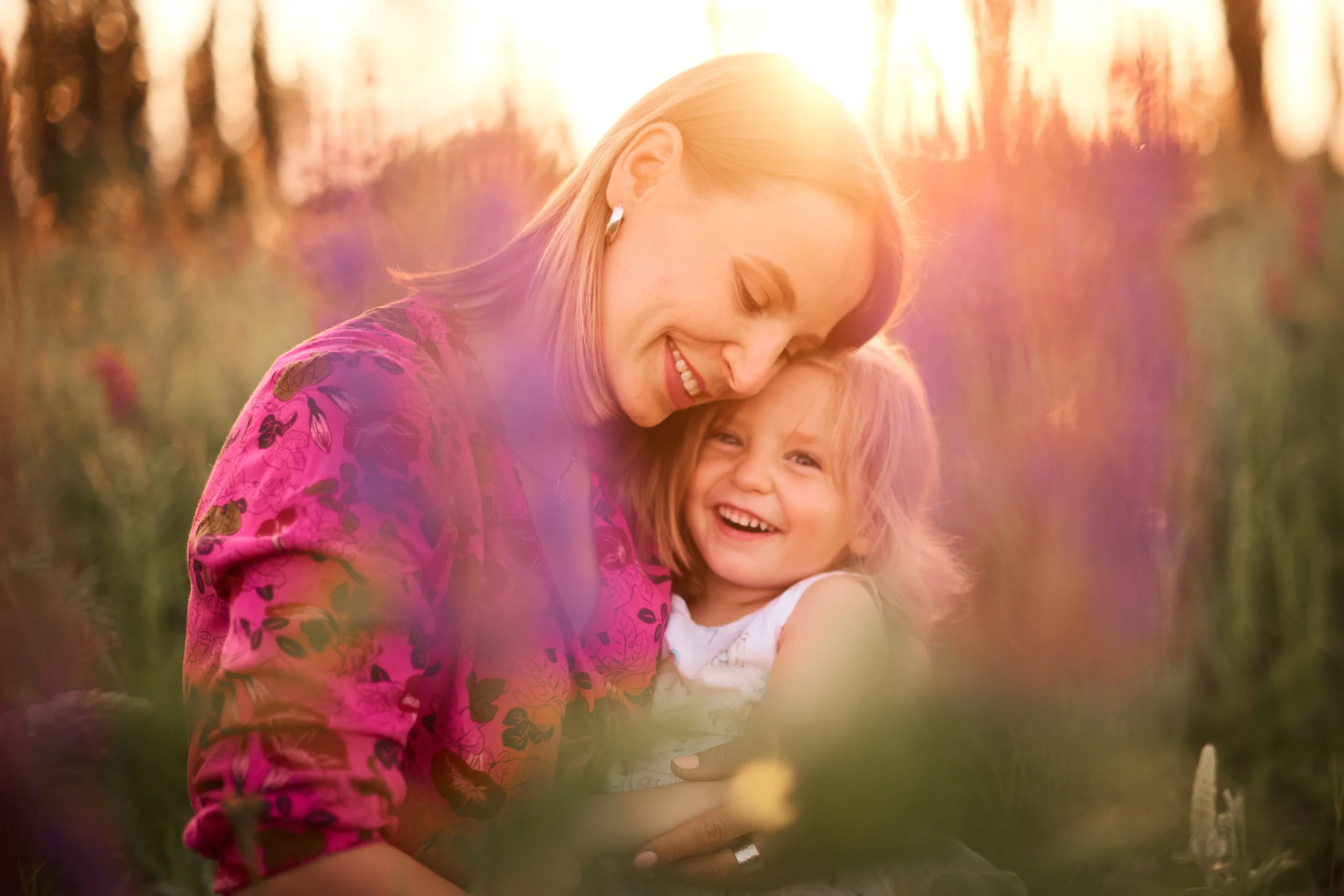 Parent calmly connecting with child, showing emotional healing and breaking trauma response patterns