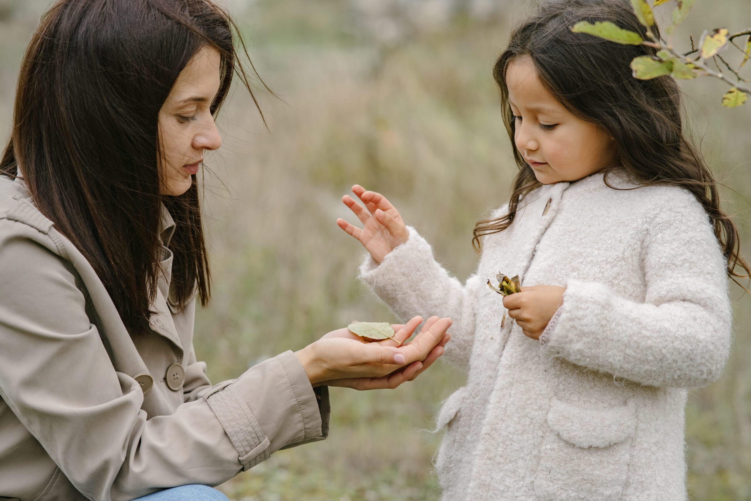 connection before correction teach cute little girl with her mom